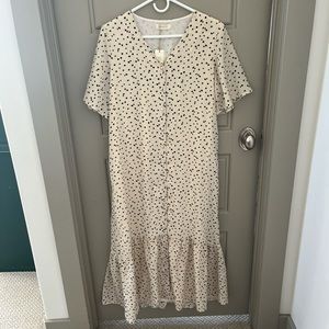 such a cute pattern and fabric and just overall the dress is so cute.